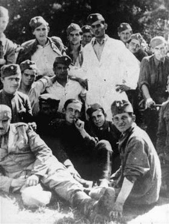 Ustasa guards pose for a photo a Jasenovac